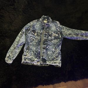 jean jacket with white paint splatter